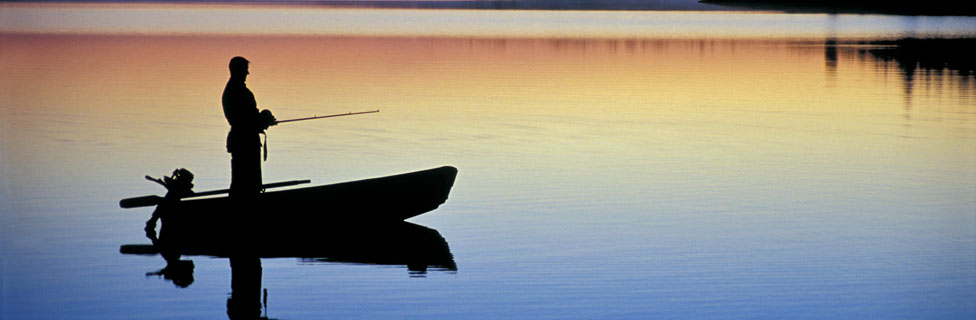 fishing in boat on a lake